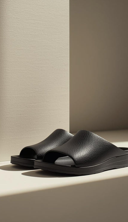 Explore minimal sandals, flip flops, and clogs crafted for comfort and clean modern style. Lightweight everyday footwear for travel, streetwear, summer outfits.