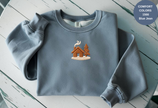Unisex Garment-Dyed Sweatshirt with Cozy Cabin Embroidery