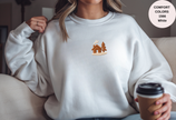 Unisex Garment-Dyed Sweatshirt with Cozy Cabin Embroidery