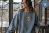 Unisex Garment-Dyed Sweatshirt with Cozy Cabin Embroidery