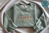 Caution Tired Human Printed Unisex Garment-Dyed Sweatshirt