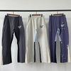 Nameria Men’s Splatter Ink Patchwork Flared Sweatpants