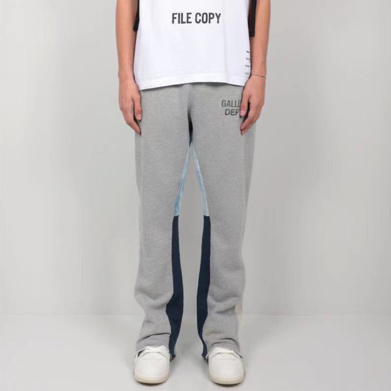 Nameria Men’s Splatter Ink Patchwork Flared Sweatpants