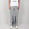 Nameria Men’s Splatter Ink Patchwork Flared Sweatpants
