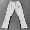 Nameria Men’s Splatter Ink Patchwork Flared Sweatpants